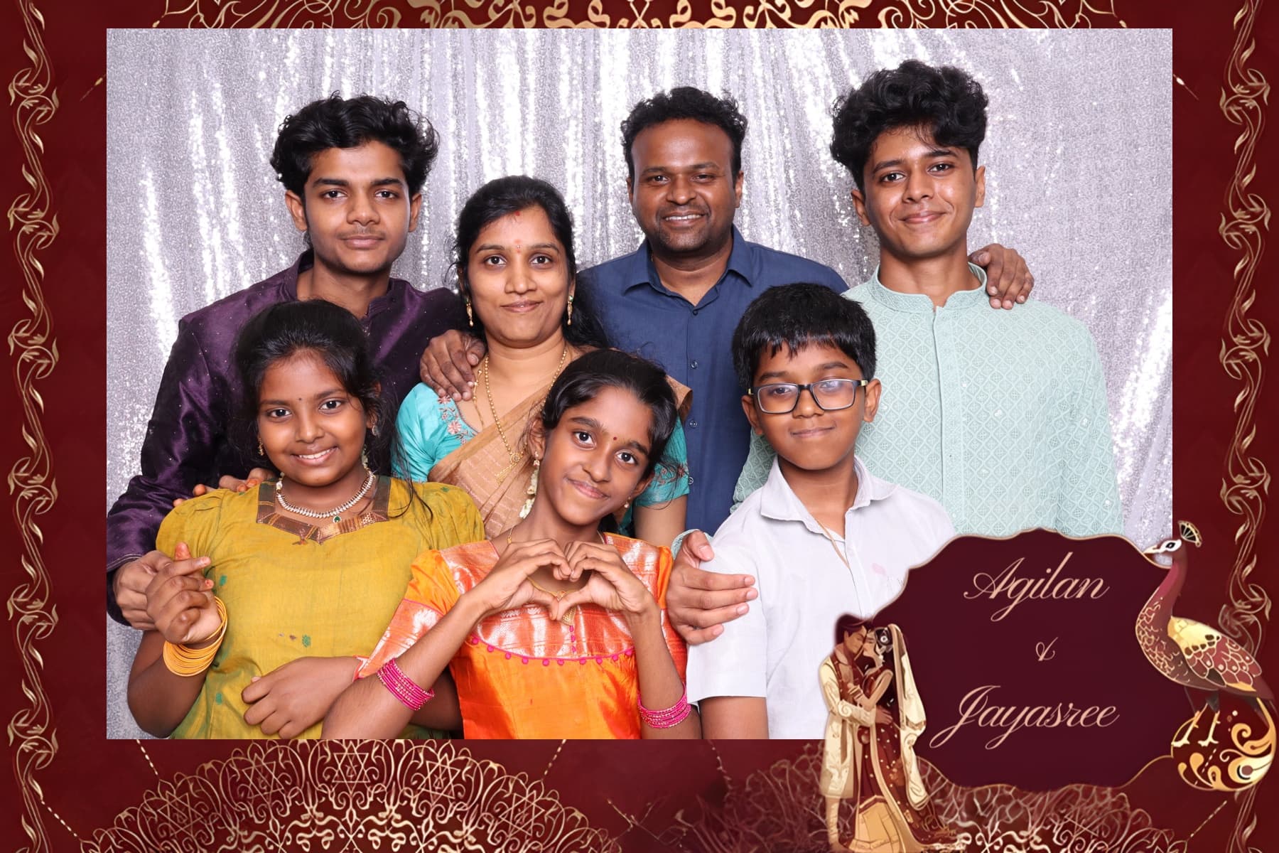 Family portrait from a wedding photobooth with custom print frame